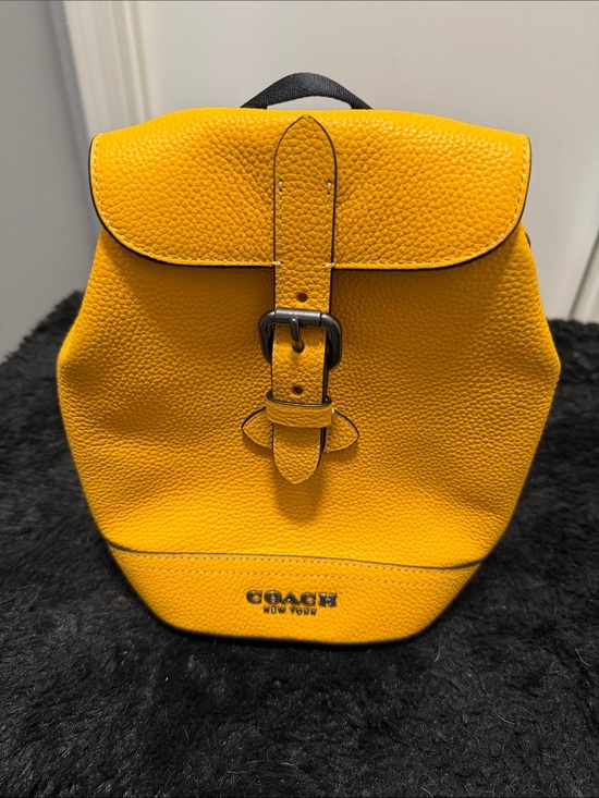 Coach Handbags - Coach Yellow Pebbled Leather Mini Backpack
